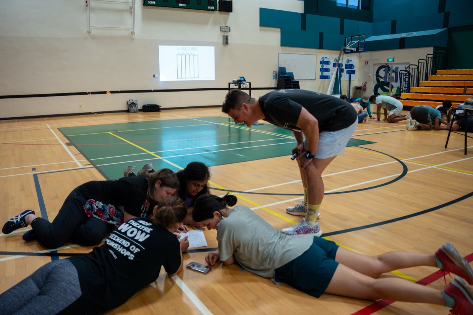 Students doing energetic activities in a play-based session