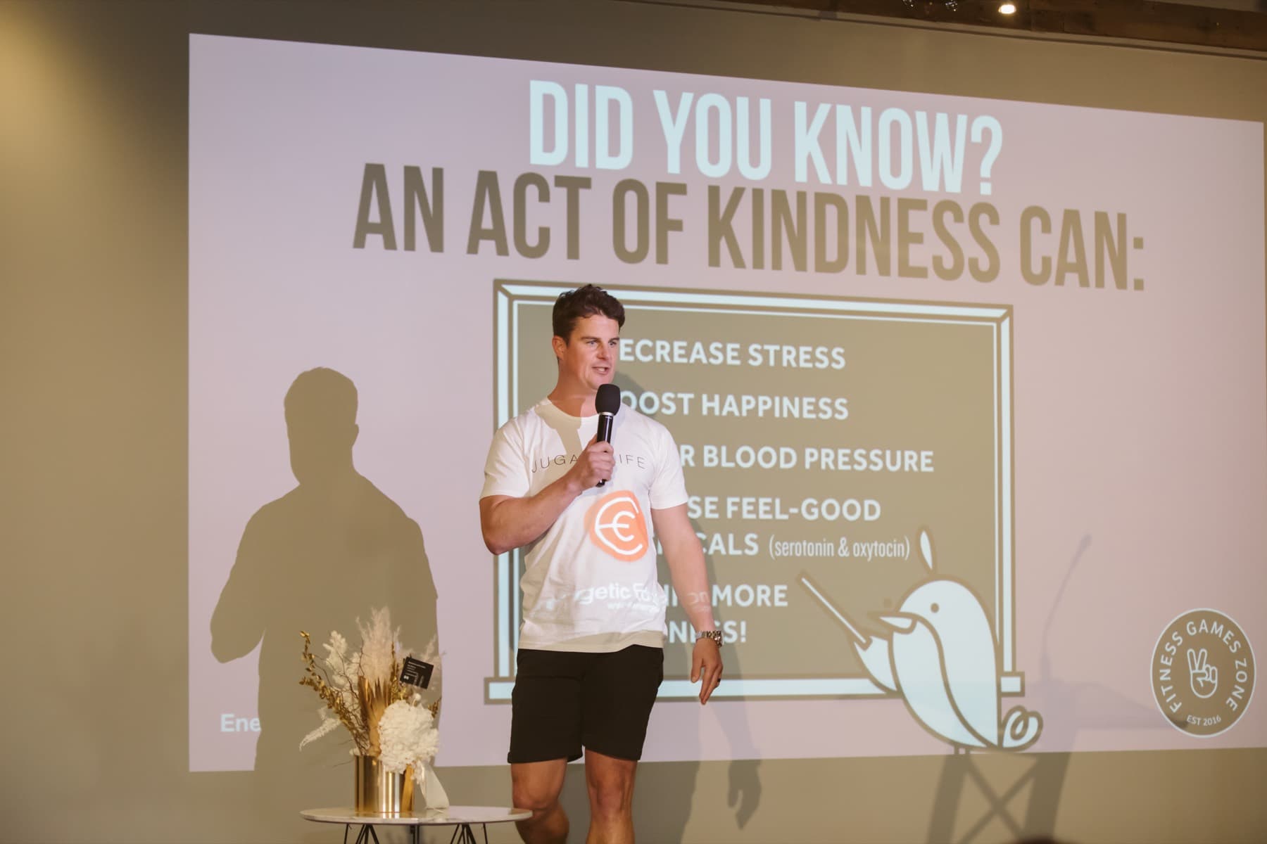 A participant laughing during a workshop activity